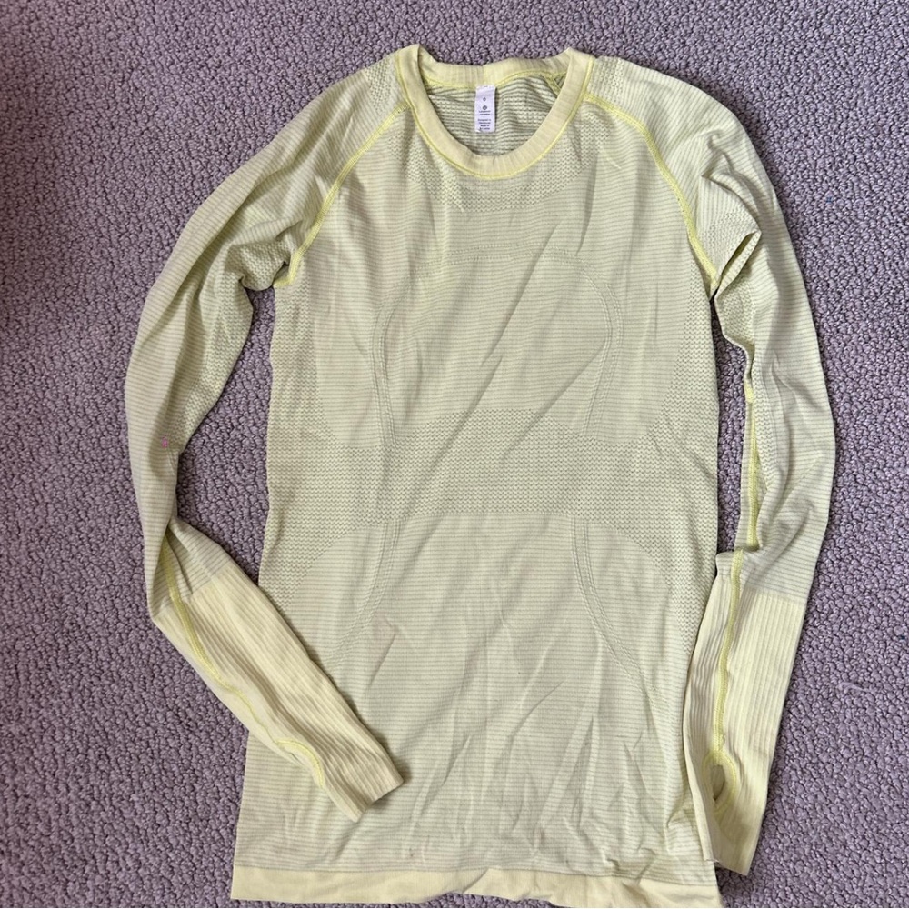 Lululemon long sleeve swiftly tech workout top in yellow.